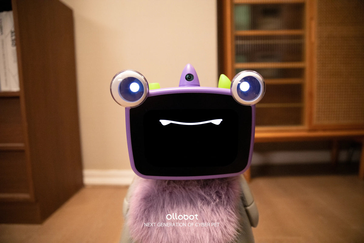 Front close-up of Ollobot smart robot companion showing expressive face and soft purple fur