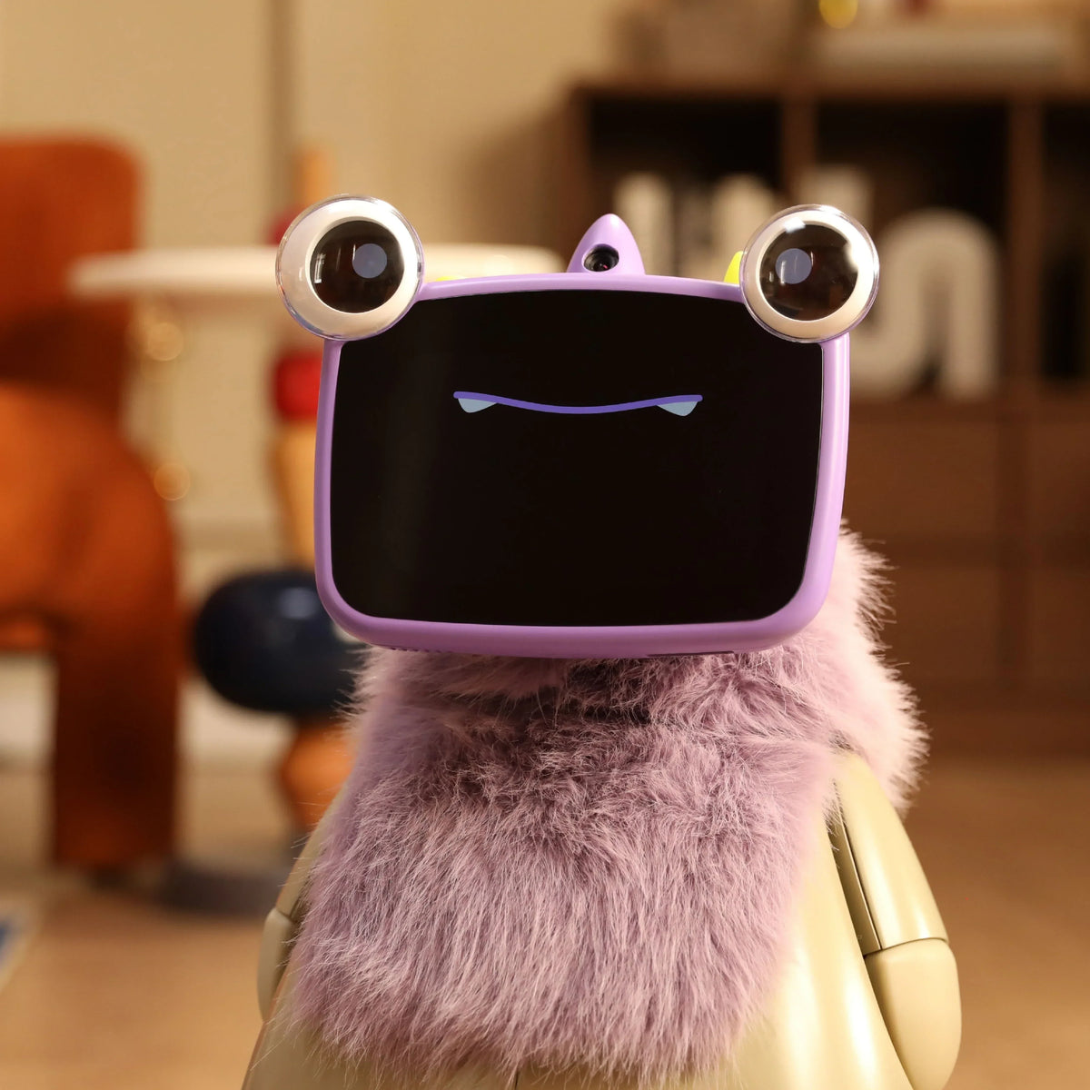Lavender robot pet with googly eyes and a smiling face on its screen.