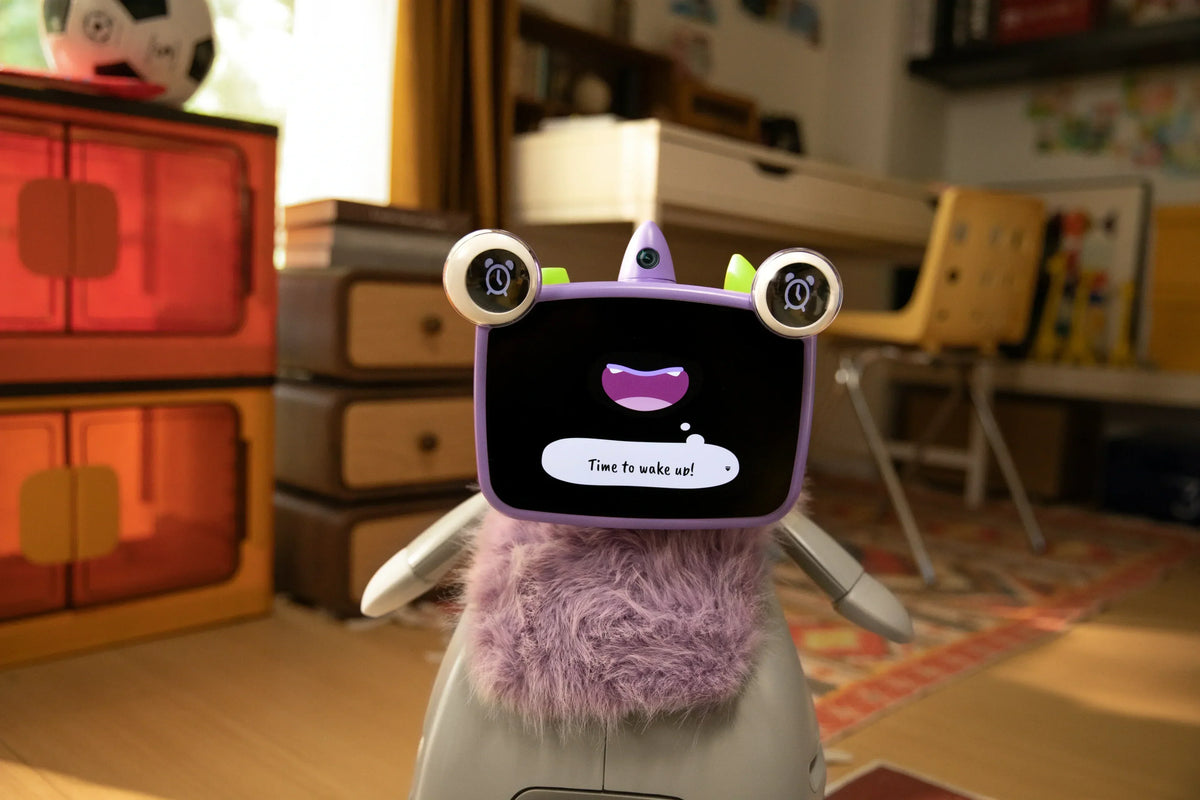 Ollobot AI companion robot displaying Time to wake up alarm message in a kids bedroom